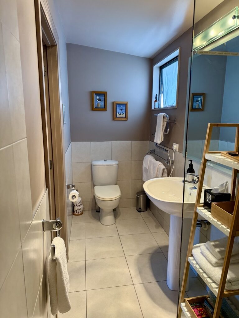 Pool View Room private ensuite with towels, amenities