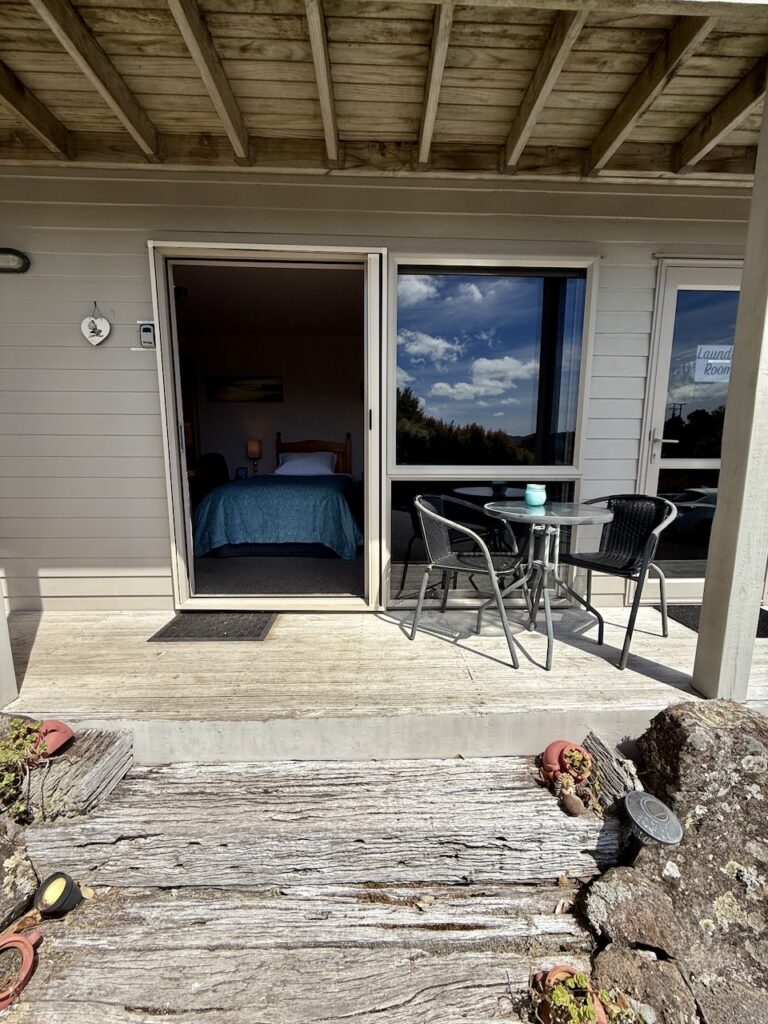 Twin room patio seating area at King's View Lodge